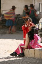 Peruvian girls eating candy.jpg